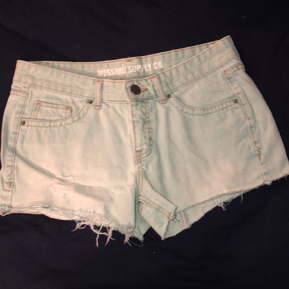 teal-dyed denim shorts